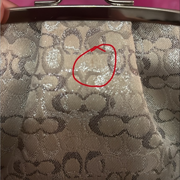 Authentic Coach signature canvas wristlet in silver/gold.